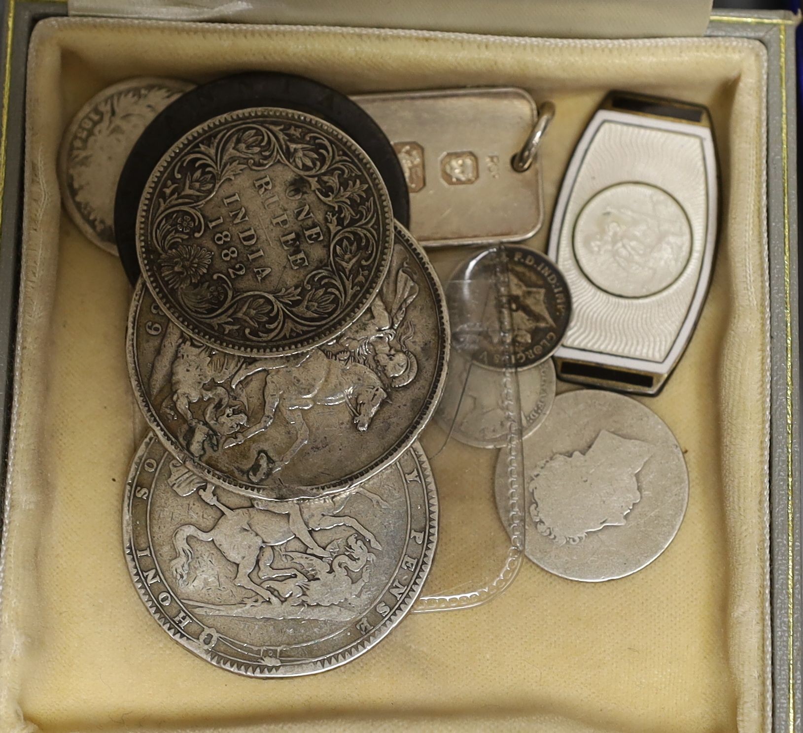 A group of silver medallions and silver coins including two crowns